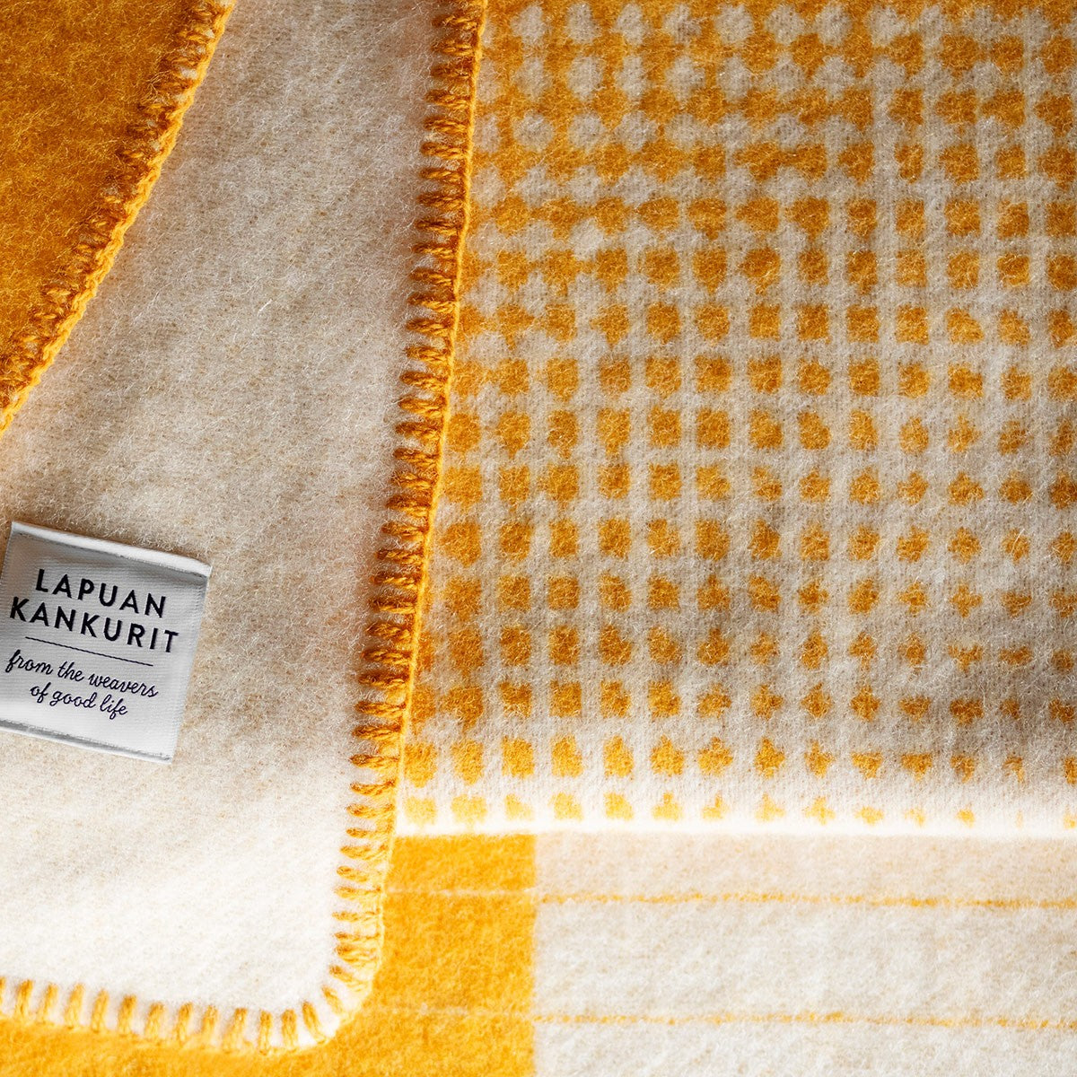 Lapuan Kankurit Kaamos Coffee Dyed Orange / White Wool Blanket